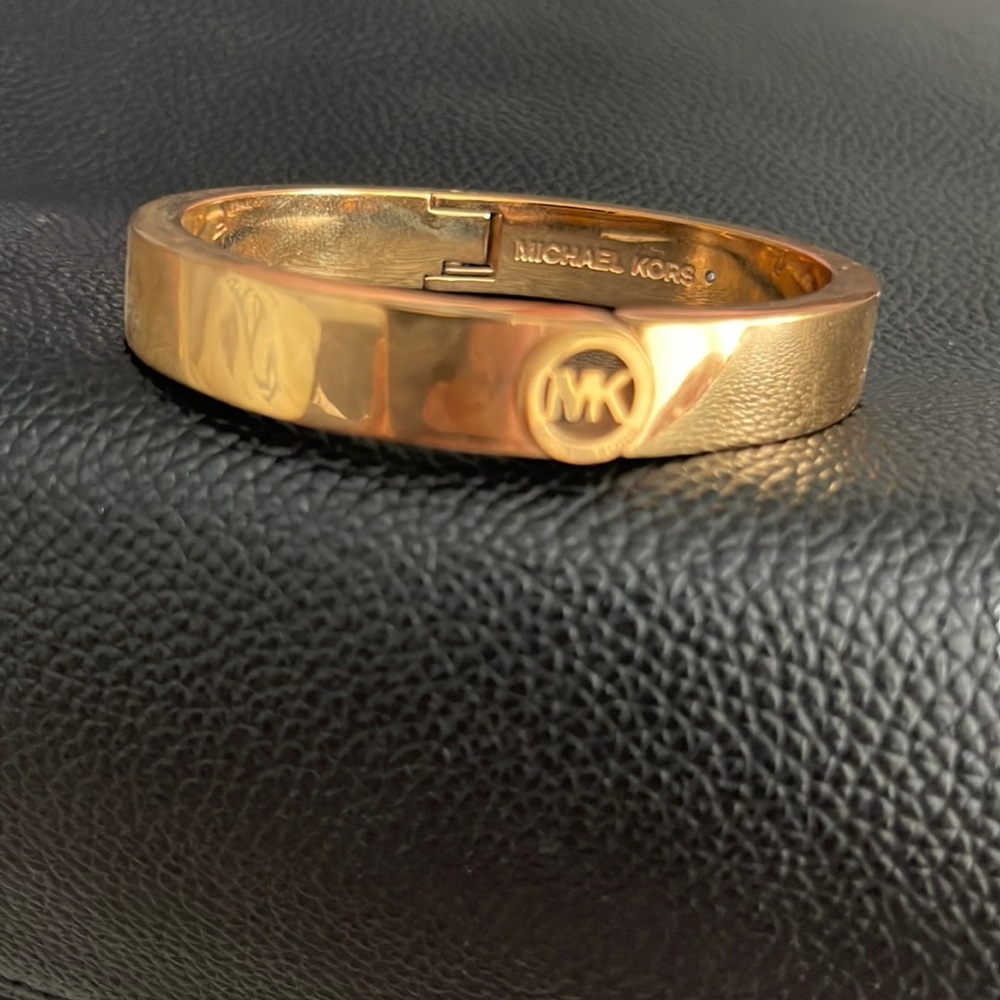 Michael Kors, logo bangle bracelet. Rose gold